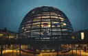 The Reichstag dome lit up at dusk