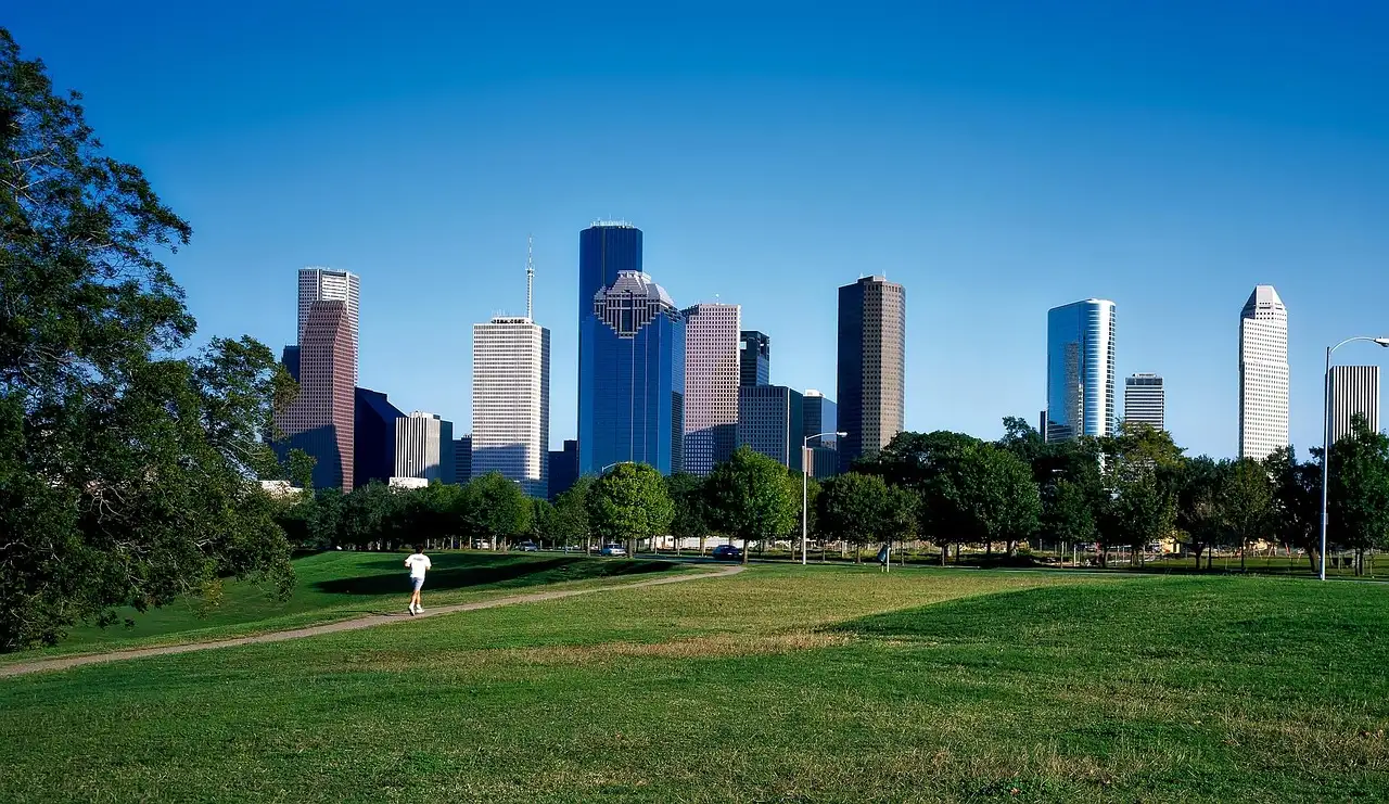 The towers of downtown Houston seen from a park