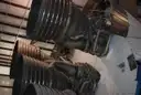 The huge engines of a Saturn V rocket on display at Space Center Houston