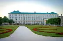 Mirabell Palace behind its garden lawns and flower beds