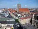 The Frauenkirche towers above the red roofs of Munich's Old Town, with Marienplatz below