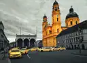 Odeonsplatz with the Feldherrnhalle and the Theatine Church behind a row of taxis