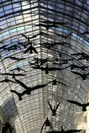 Sculpted Canada geese flying under the glass roof of the Toronto Eaton Centre